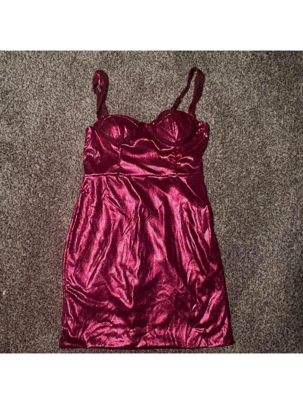 Burgundy metallic mini dress with adjustable straps and a flattering fit.